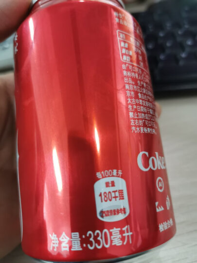 可口可乐 Coca-Cola 汽水 碳酸饮料 330ml*24罐 整箱装 可口可乐公司出品 新老包装随机发货 晒单图