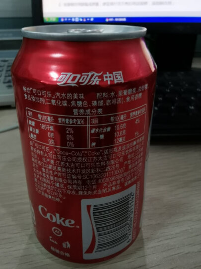 可口可乐 Coca-Cola 汽水 碳酸饮料 330ml*24罐 整箱装 可口可乐公司出品 新老包装随机发货 晒单图