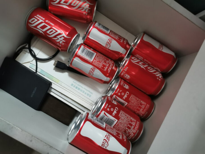 可口可乐 Coca-Cola 汽水 碳酸饮料 330ml*24罐 整箱装 可口可乐公司出品 新老包装随机发货 晒单图