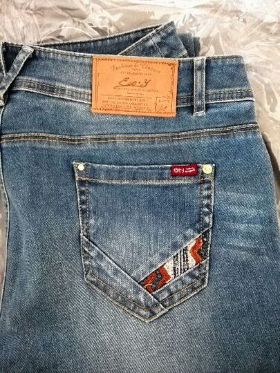 逸阳女裤2014夏款 逸阳牛仔女裤