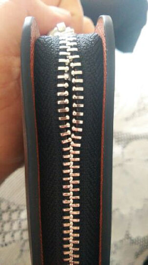 商务牛皮手拿包030071 尊贵黑--刚使用拉链就