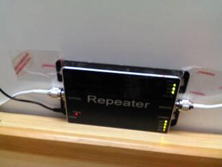 喜越 003手机信号放大器移动联通电信三网通