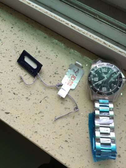 浪琴机械男表:表收到了,膜没撕掉,就是吊牌线