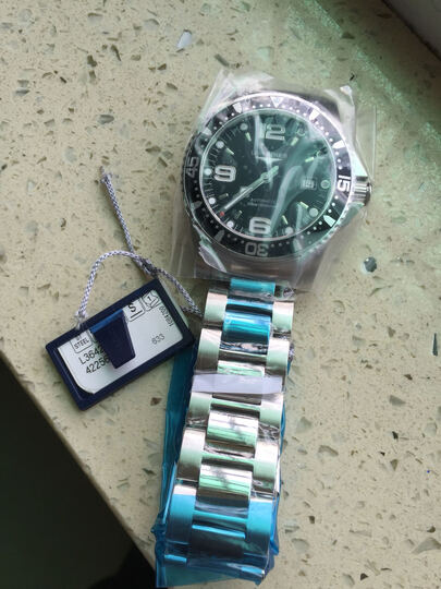 浪琴机械男表:表收到了,膜没撕掉,就是吊牌线