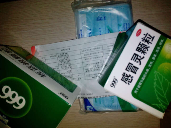 999感冒灵颗粒图片实拍,一杯感冒冲剂实拍图片 三九999感冒灵颗粒9袋 风热感冒流感头痛发热鼻塞流鼻涕感冒药 晒单图
