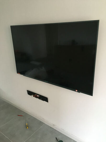 微鲸W65L:电视由京东小哥抱上楼了,感谢京东