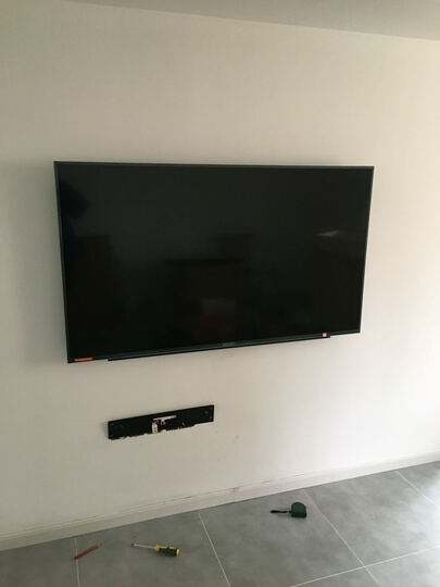 微鲸W65L:电视由京东小哥抱上楼了,感谢京东