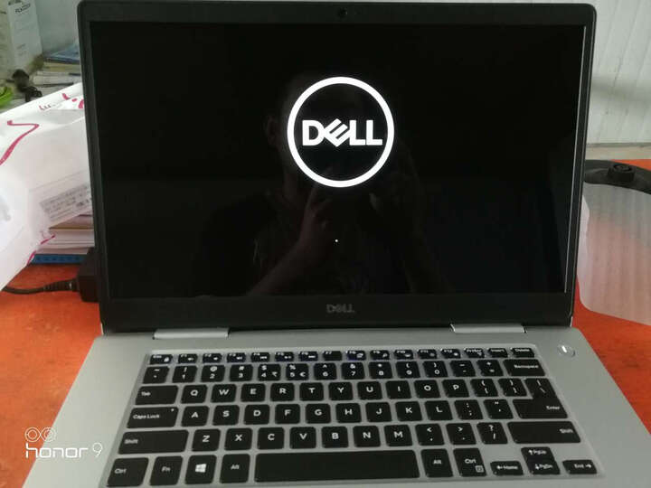 戴尔灵越:电脑风扇声音大,电脑背壳有缝隙,屏