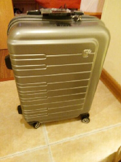 爱华仕拉杆箱:京东。你是旧货市场吗?箱子瘪