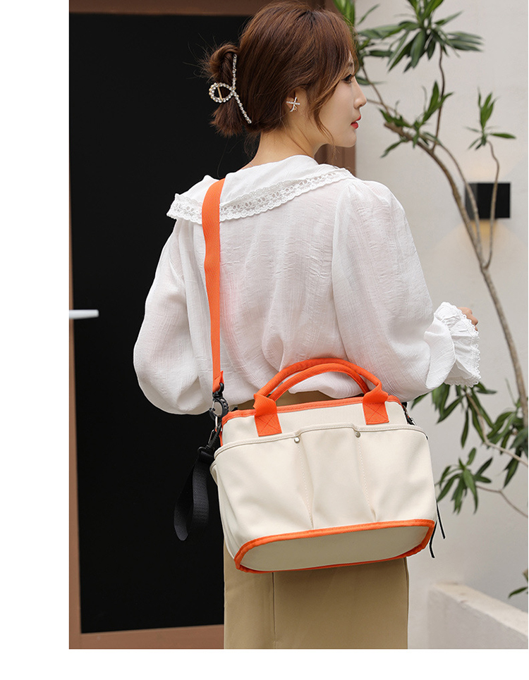 Сумка для мамы 9i9 Mami Bag, вместительная, для малыша, на плечо или в руку, цвет "Юаньци оранж"