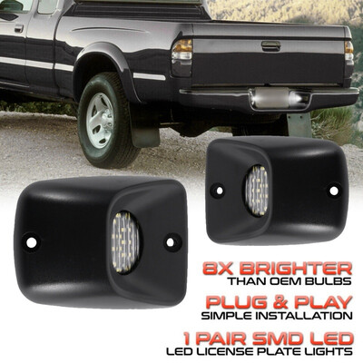 

Universal Fit 1995-2004 Toyota Tacoma FULL WHITE LEDLicense Plate Light Lamp Housing SET