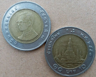 

Used Condition 26mm Wat Arun Ten-baht Bi-metallic Coin Old series Young King Bhumibol Adulyadej Thailand