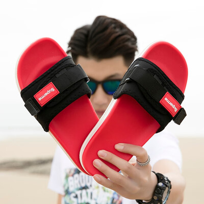

Korean version of the slippers mens summer fashion wear beach non-slip soft bottom word drag