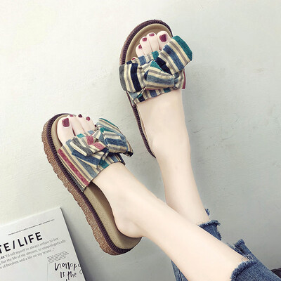 

Haragufeng slippers women wear 2019 summer new bow Hong Kong wind thick bottom net red sponge cake thick bottom sandals tide