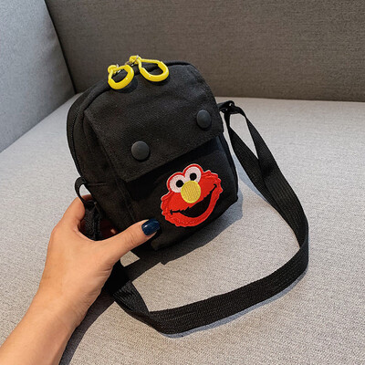 

Cute cartoon simple wild shoulder Messenger bag female 2019 new casual fashion ugly cute Sesame Street canvas bag