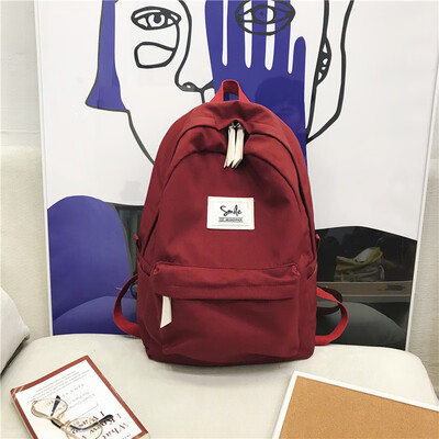

Ancient girls school bag womens campus Korean version of high school students backpack impact color simple two - shoulder bag ins