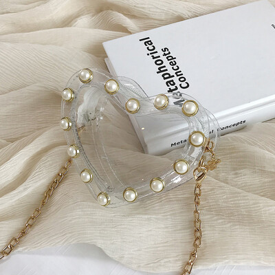 

Advanced sense of the atmosphere personality transparent handbag 2019 new fashion wild love heart-shaped mini chain Messenger bag