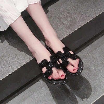 

Korean version summer fashion wearing h slippers outside water drill port wind flat bottom one-word sandy beach cool slipper tide