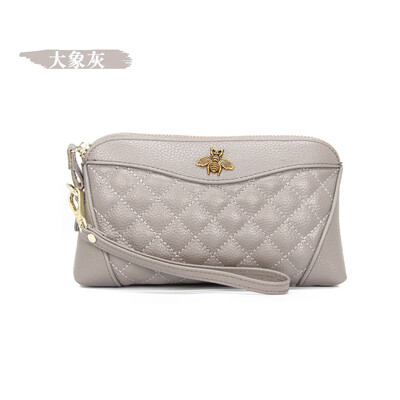 

The first layer of cowhide 2019 new ladies leather Europe&America bee bills position shell type clutch bag long wallet