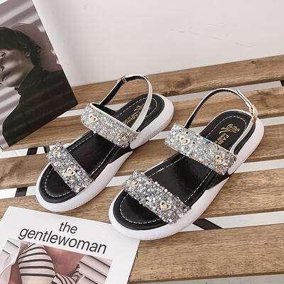 

Sports sandals female fashion muffin water drill 2019 summer new hundred lap students ins super hot thick soled Roman shoes