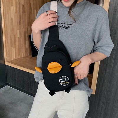

Net red texture mini bag female 2019 new foreign air canvas bag female Messenger bag wild duck breast bag