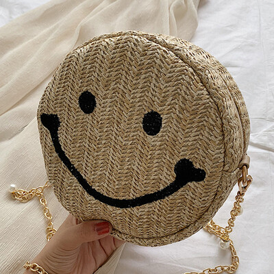 

Women 2019 spring&summer new Chaohan version of smiling face bag round straw bag single shoulder slanted womens bag beach bag