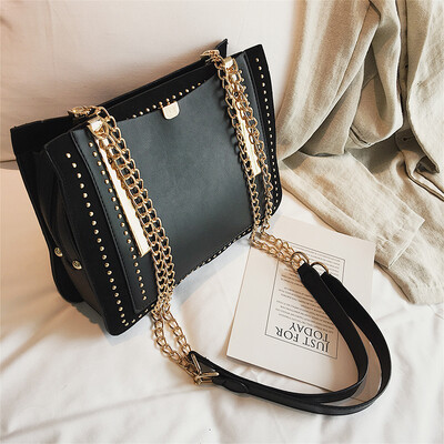 

Hong Kong style small bag female 2019 summer new wave personality rivet tote bag Korean version of the wild shoulder slung female