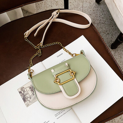 

Qiao Bani 2019 new Korean fashion Dongdaemun hit color elliptical saddle bag slant diagonal cross-flow PU handbag