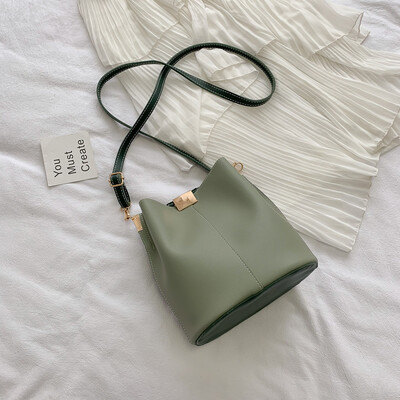 

2019 new Korean version of the small fresh casual wild shoulder Messenger bag female Sen simple temperament solid color bucket bag