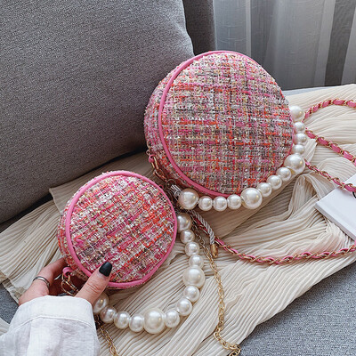 

Korean version of the small bag 2019 new fashion pearl hand bag small round bag one shoulder bag