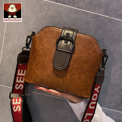 

On the new womens bag 2019 new tide Korean broadband shoulder bag foreign gas Joker retro slung bucket bag