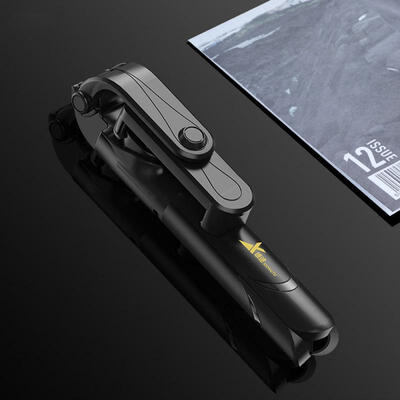 

XT09 Portable Extendable Bluetooth Remote Control Selfie Stick With Desktop Tripod Design For Live Broadcast