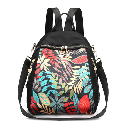 

Double shoulder bag female Oxford leisure fashion printing travel canvas small backpack Korean version 100