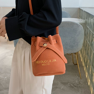 

Small bag female 2019 autumn new wave Korean version of the wild slung shoulder shaved fashion casual solid color bucket bag