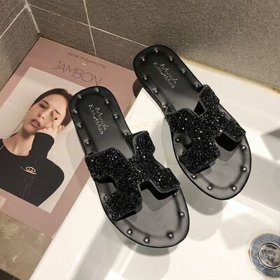 

H slippers women summer wear flat bottom rhinestone rivets drag anti-slip soft sister wind chic beach shoes Korean version