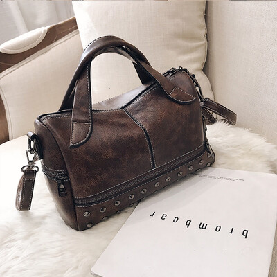

Chic bag female 2019 new handbag Korean fashion retro rivets versatile shoulder slung Boston bag