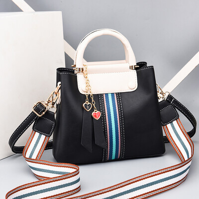 

Baggage ladies summer fashion hand-held large capacity collision color bucket bag simple texture Baitao soft slanting