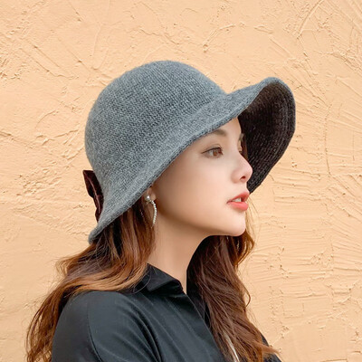

Fall&Winter 2009 Fishermans Cap New Cute Butterfly Knot Korean Edition Ladys Pure-color Fresh Baitie Knitted Wool Cap