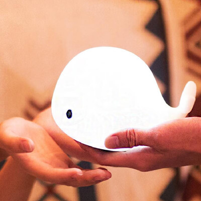 

Dolphin colorful silicone lamp Wangcai pat light usb whale led bedroom night light charging atmosphere induction table lamp