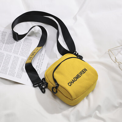 

Ins bag female 2019 new wave casual letter shoulder small round bag Korean version of the simple solid color canvas Messenger bag