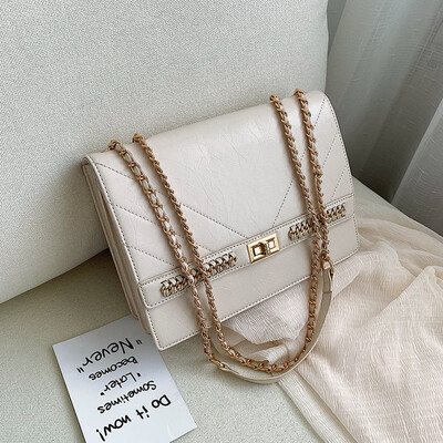 

Qiao Bani 2019 new European&American style fashion street shooting solid color chain flip cover shoulder slant diagonal trend handbags