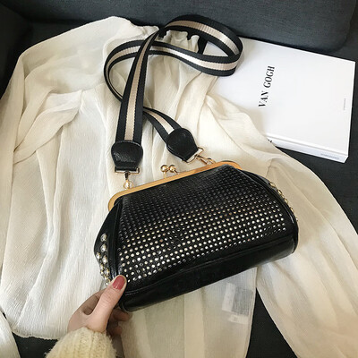

Qiao Bani 2019 new European&American style fashion punching&drilling jigs baodan shoulder diagonal tide women bag cross-border special