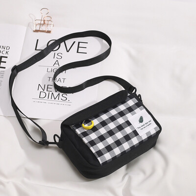 

Chic literary girl slung small bag female 2019 plaid canvas bag Japanese foreign gas wild shoulder student bag