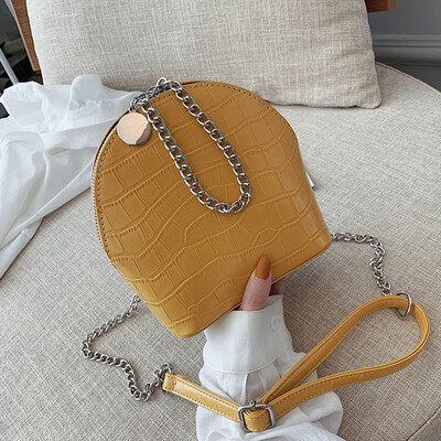 

2019 new Korean version of shell bag woman slanted mini stone grain women bag chain carrying single shoulder bag tide