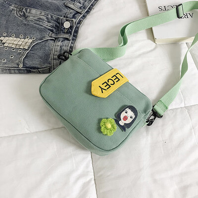 

Casual wild shoulder canvas bag fashion personality letter Messenger bag female 2019 new cartoon cute small bag
