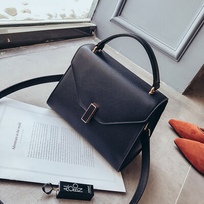 

Qiao Bani 2019 new European&American style fashion simple solid color flip handbag handbag shoulder diagonal temperament female bag