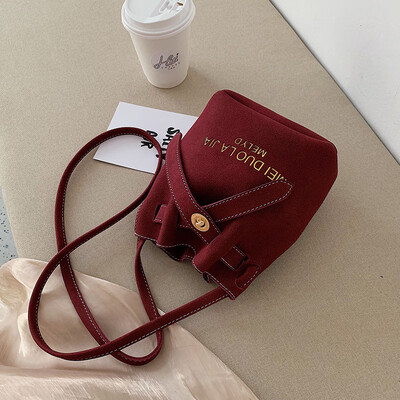 

Small bag female 2019 autumn new wave Korean version of the wild slung shoulder shaved fashion casual solid color bucket bag