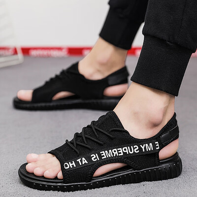

Summer sandals Korean version of the trend of mens personality wearing a word sandals beach shoes hole shoes tide shoes