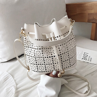 

Summer small fresh bag female 2019 new Korean fashion personality hollow bag wild single shoulder slung bucket bag