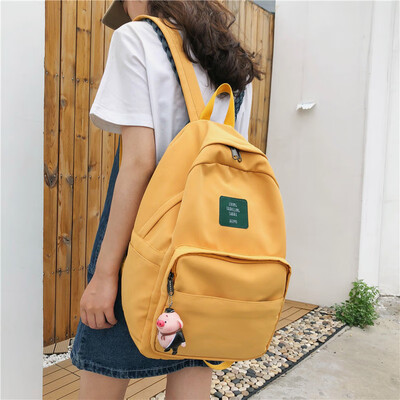 

Ifashion bag female Korean high school pure color ins wind ancient feeling backpack female travel leisure backpack female